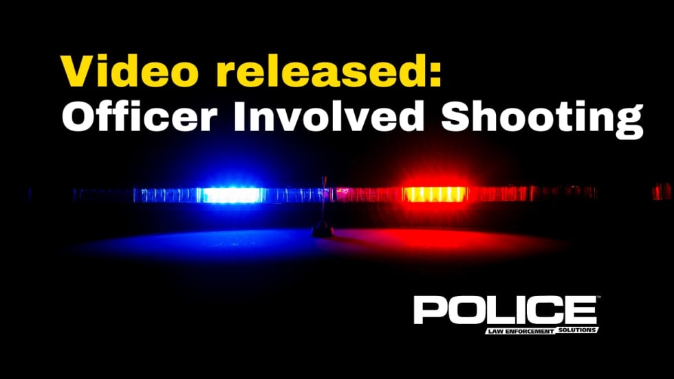 Police emergency lights with text about officer-involved shooting incident