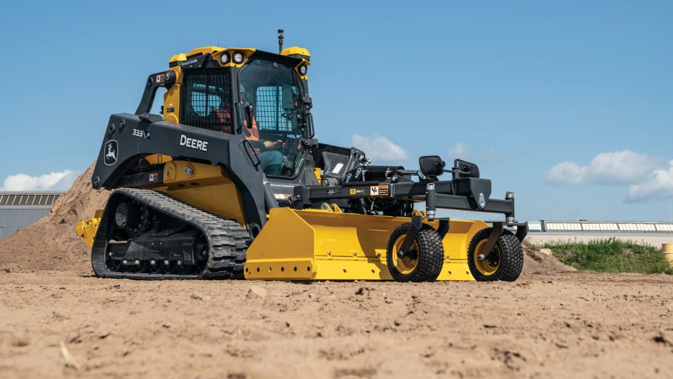 John Deere 333 P-Tier with the box blade