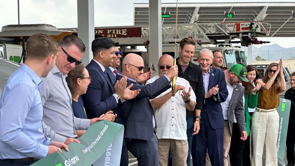 Ribbon cutting at charging depot opening. 