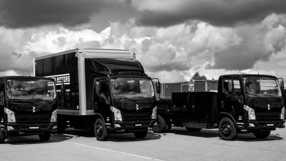 Black and white image of three variations of a Bollinger Motors B4. 