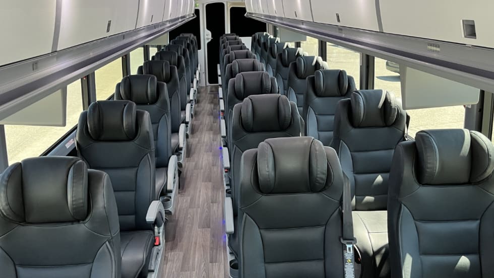 Interior of a MCI J4500 bus with 2+1 executive seating.