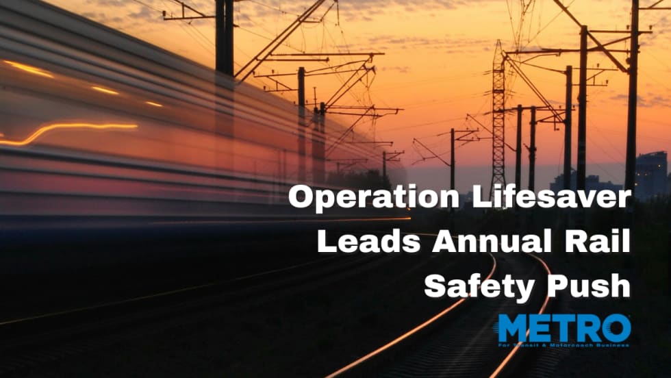 A train passing by during sunset.