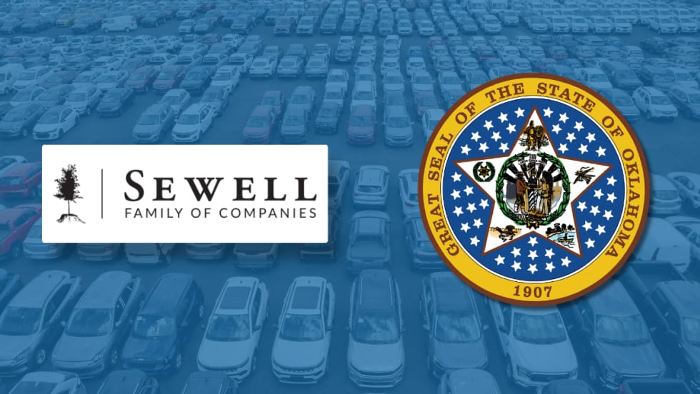 Graphic showing Sewell Family of Companies logo and Oklahoma state seal over a background of parked vehicles, representing a statewide fleet contract agreement.