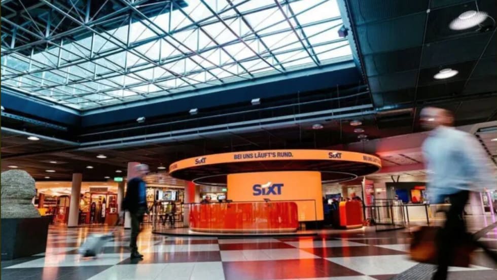 A Sixt service area in an airport terminal.