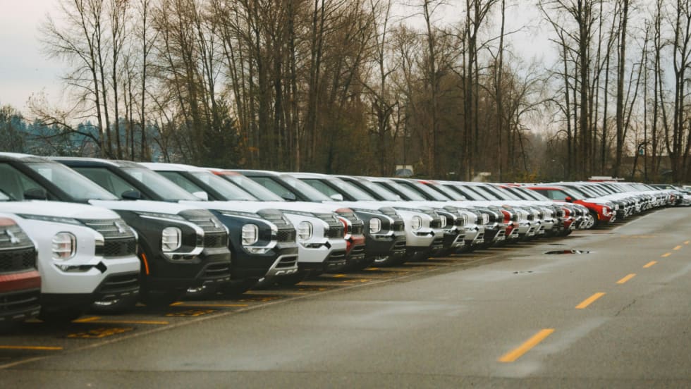 lineup of SUVs outside