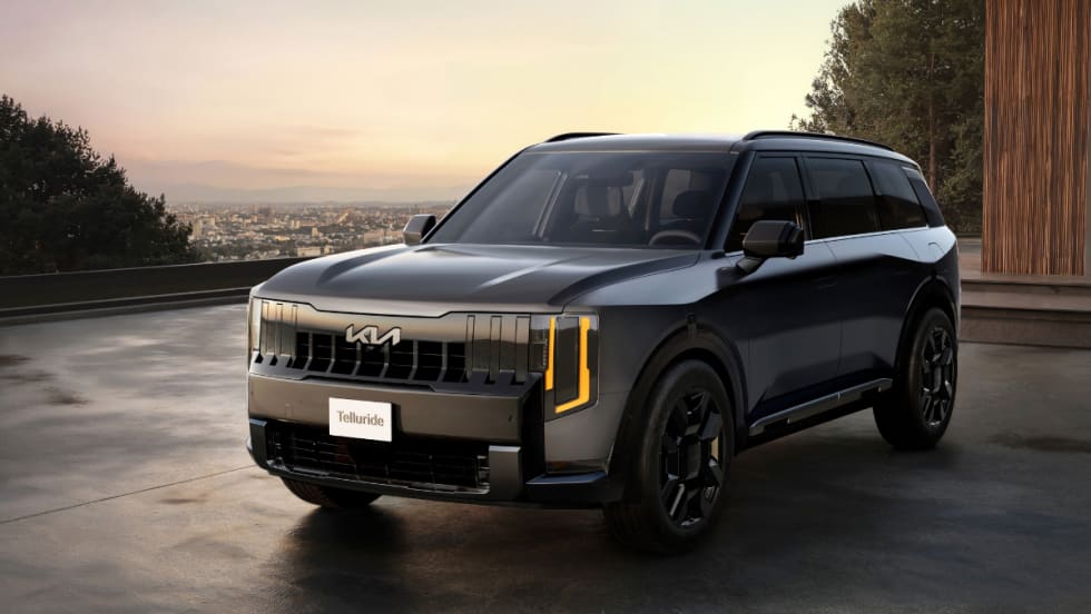 The new 2027 Telluride is set against a sunset landscape.