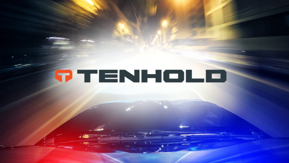 Tenhold logo over blurred nighttime driving scene with police lights, representing vehicle outfitting solutions designed for first responder safety and equipment access.