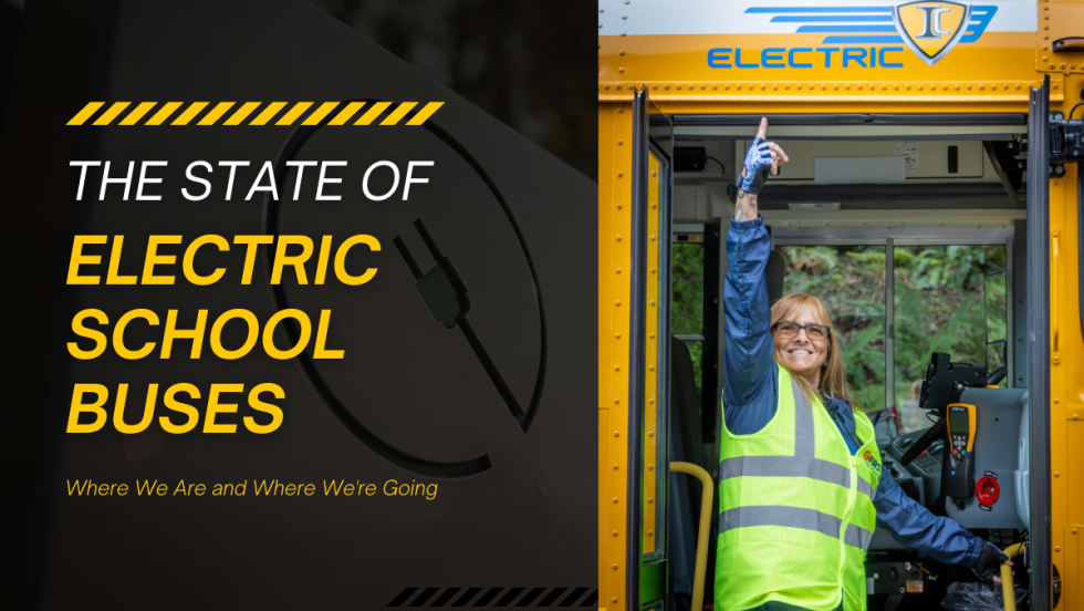 Bus driver in safety vest gives a thumbs-up in the doorway of an IC electric school bus