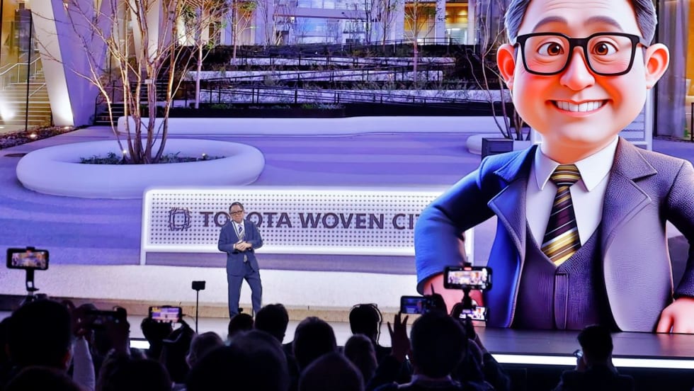 Toyota executive delivers an on-stage address.