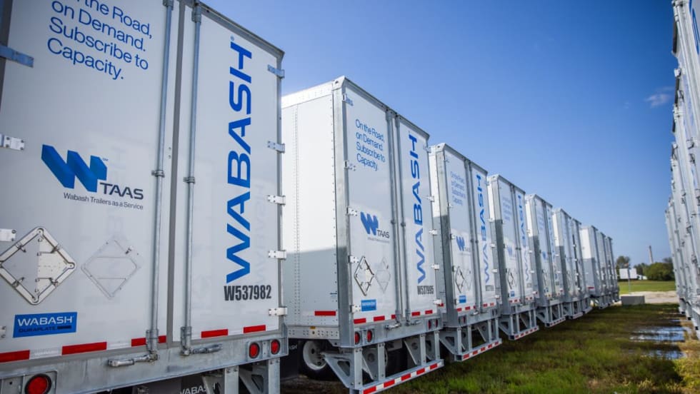 Photo showing line of Wabash trailers