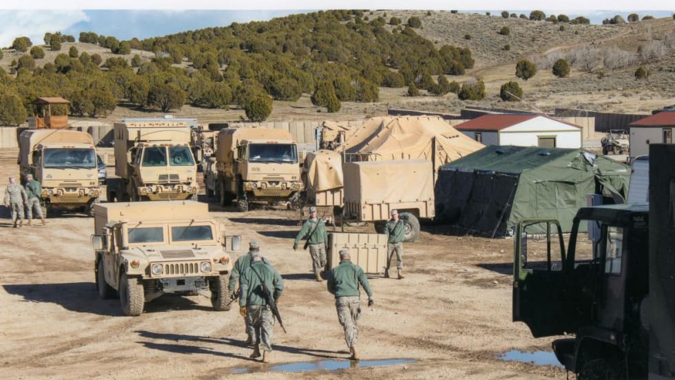 U.S. Army Humvees in a desert.