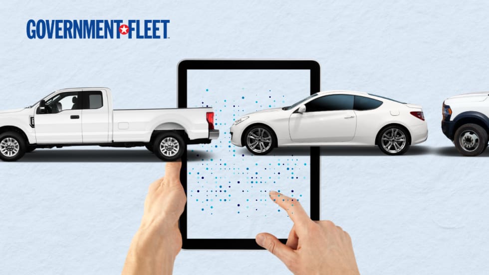 a GRAPHIC OF A TABLET WITH VEHICLES AND GF LOGO.