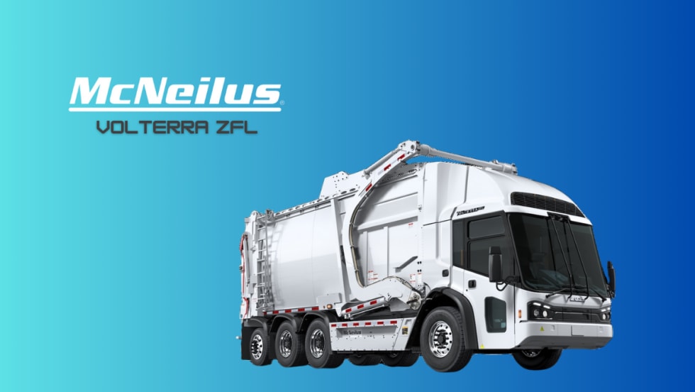 A white McNeilus Volterra ZFL electric front loader is shown against a blue background.