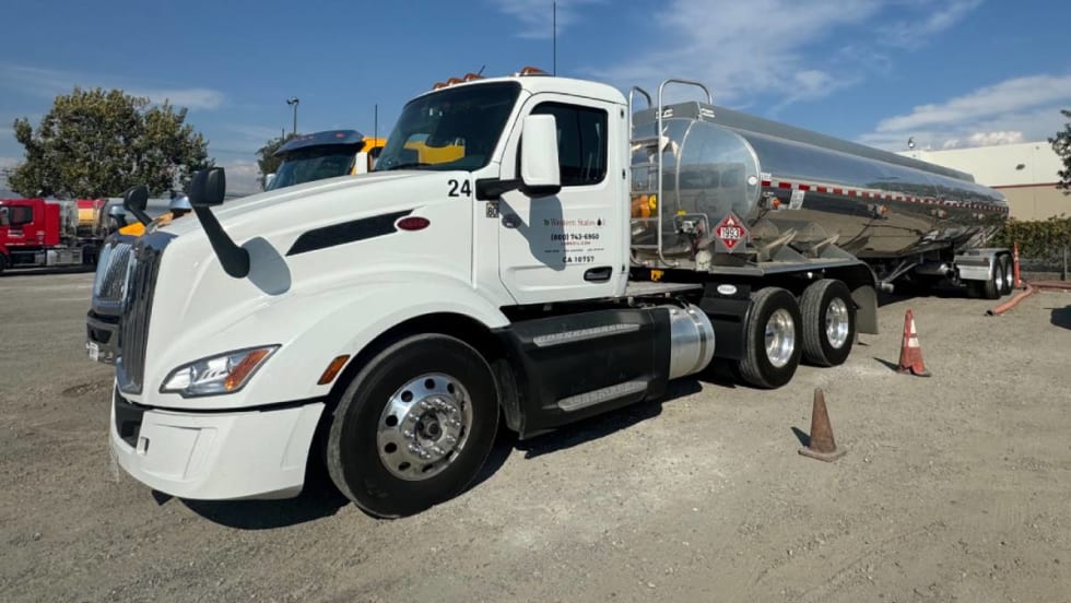 Western States oil tractor pulling a tanker trailer