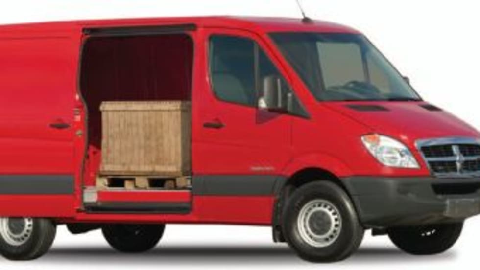 2007 Dodge Sprinter Cargo van with door open on white background