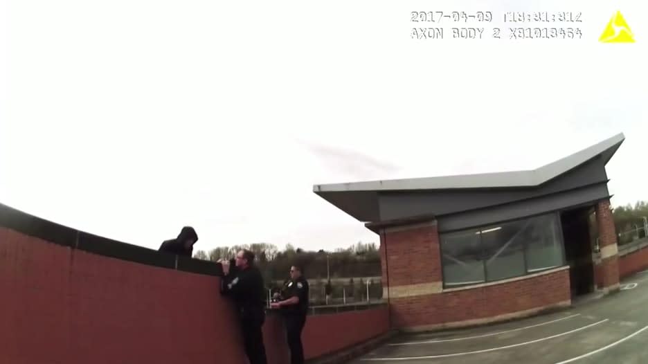 Video: WA Officer Rescues Man Dangling From Parking Structure