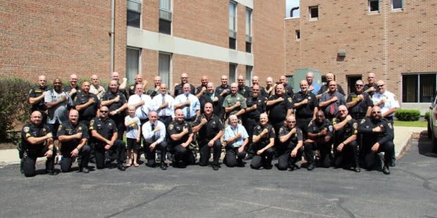 New York Officers Shave Heads in Support of Cancer-Stricken Coworker