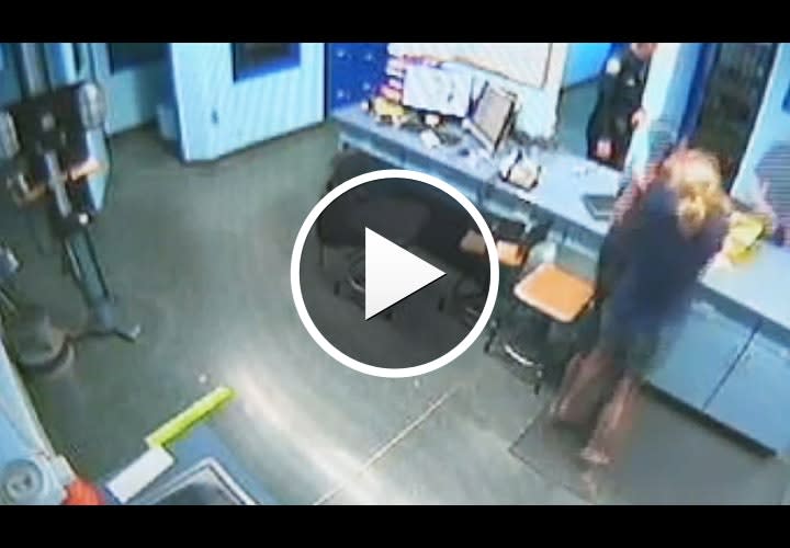 Video: Fla. Woman Chokes Officer at Station After Arrest