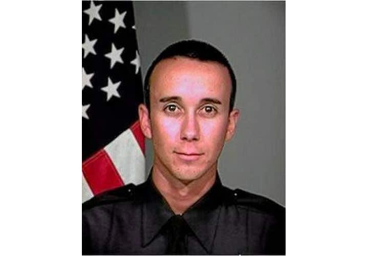 Shot California Officer Still in Coma