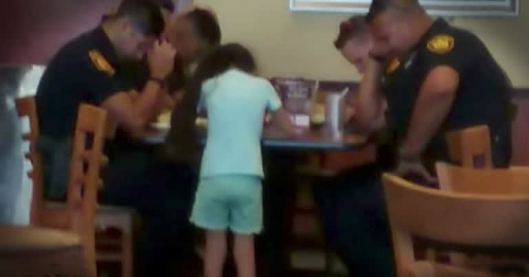 8-Year-Old Girl Prays with San Antonio Officers