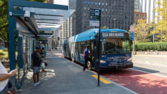 PRT bus stop with articulated bus.