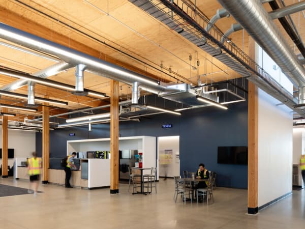 Interior image of C-TRAN's campus expansion kitchen and tables.