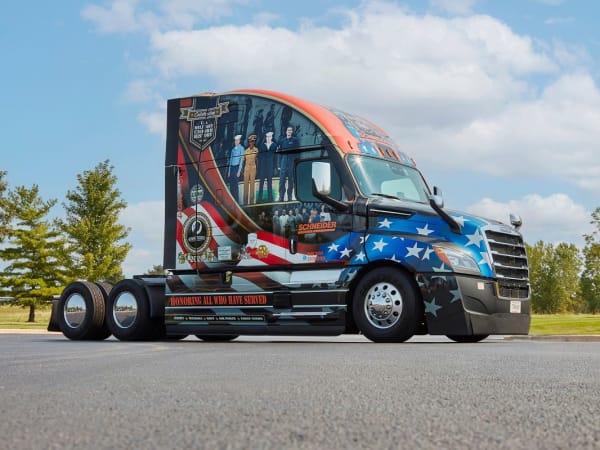 Schneider National historic trucks.