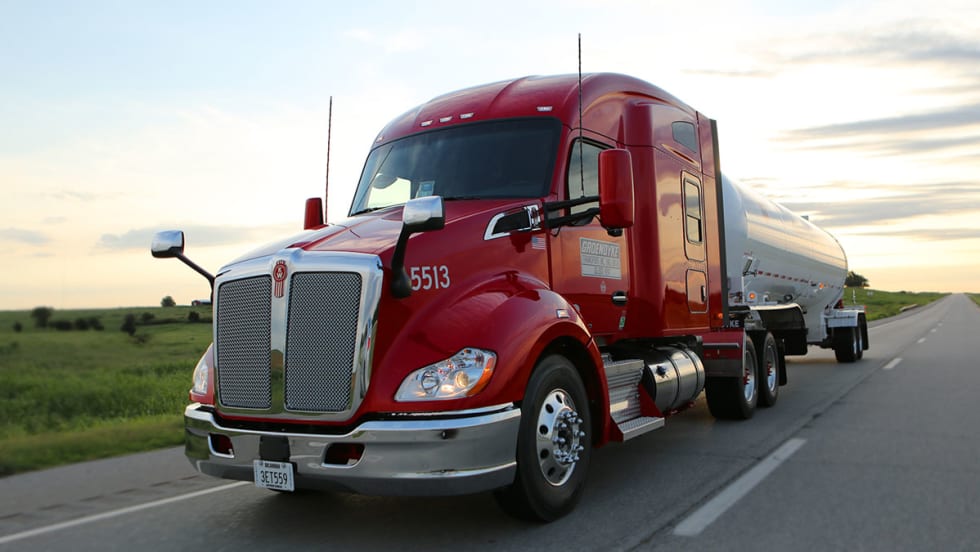 Red Groendyke tractor with tanker trailer