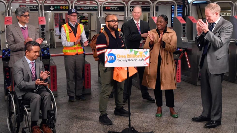 Sri Michael Carrasquillo receives his award