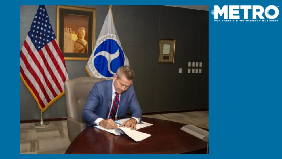 Secretary Duffy signing first memorandum