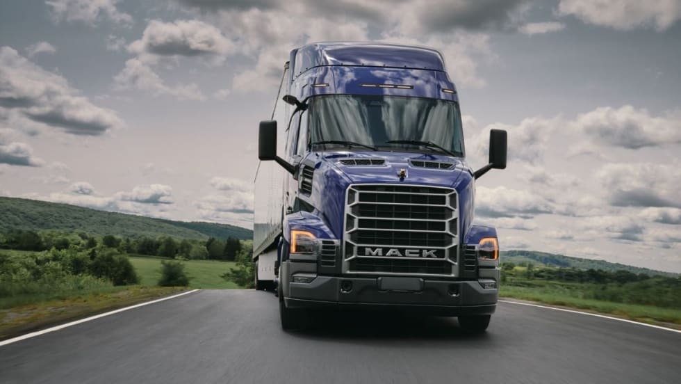 Blue Mack Anthem truck on highway
