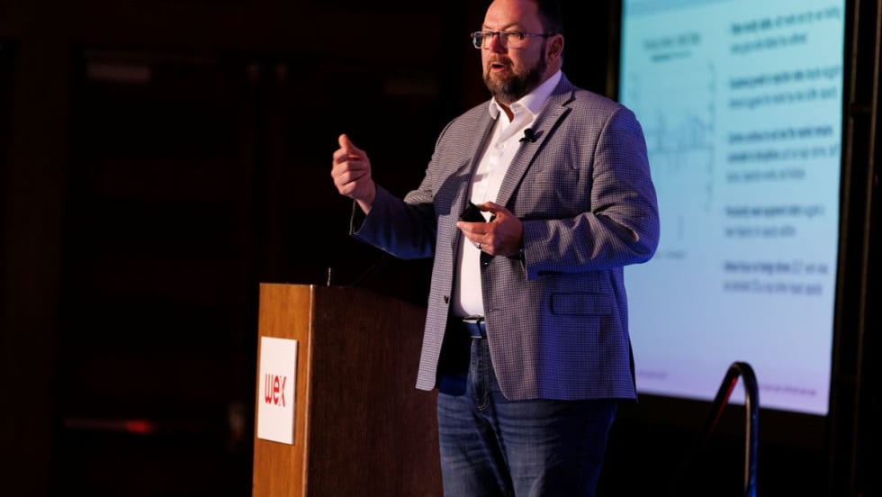 Werner Enterprises CEO Derek Leathers on stage at Wex OTR Summit