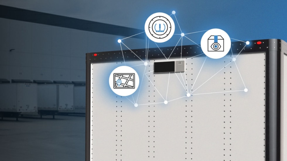 Close-up of a trailer equipped with Phillips Connect SolarNet 8000 Series showing connected icons for GPS tracking, cargo monitoring, and tire pressure data.