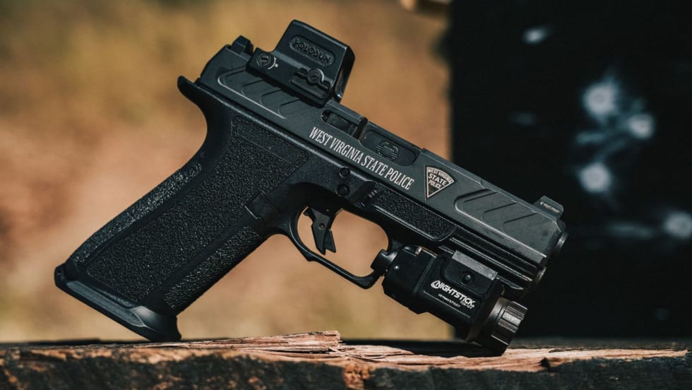side view of a police handgun with engraving for West Virginia State Police