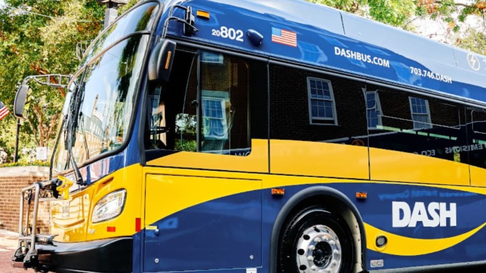 A DASH electric bus parked on a city street in Alexandria, Virginia.