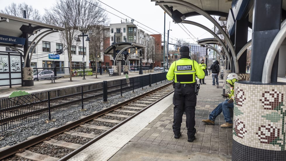 Safety officers at a CATS light rail station
