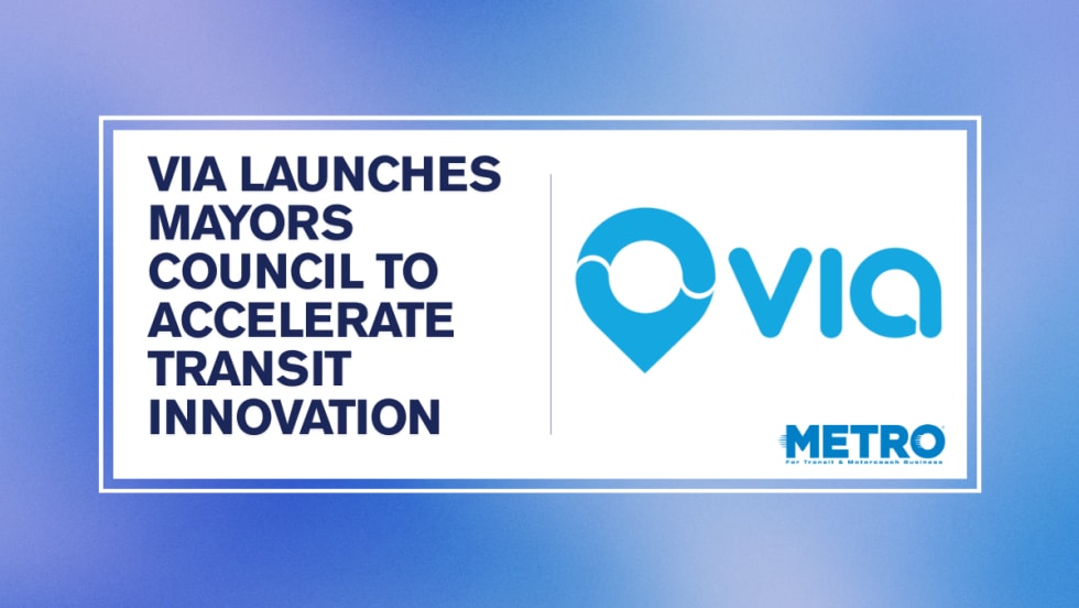 A blue and white graphic with text reading "Via Launches Mayors Council to Accelerate Transit Innovation."