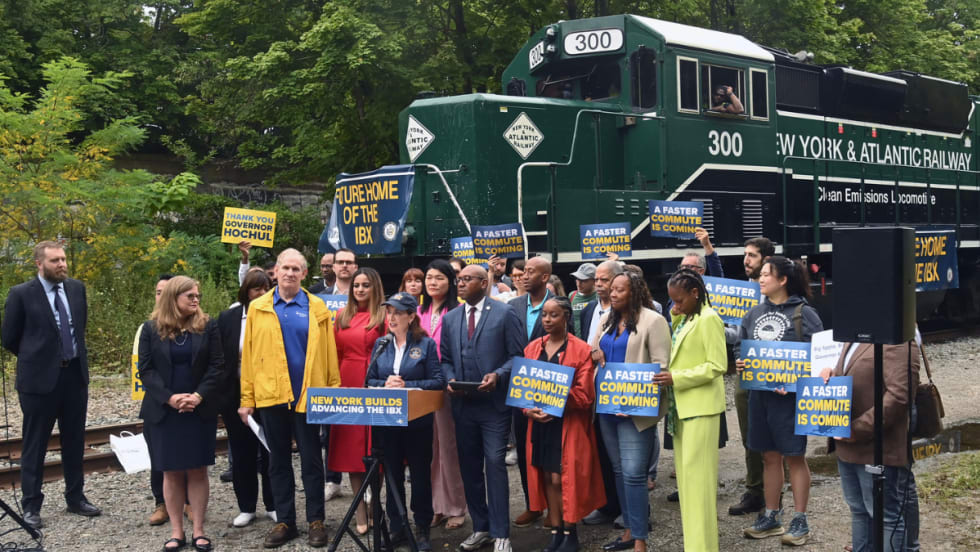 People gathering at an IBX press conference.