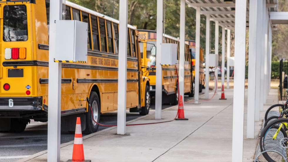 Buses lined while fueling at Orange Grove Charter School.