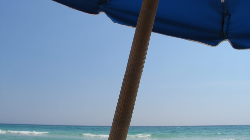 View of Gulf of Mexico from under beach umbrella