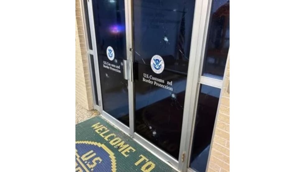 U.S. Customs and Border Protection entrance with official agency doors and welcome mat