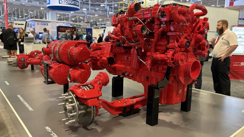 Red Cummins X15 powertrain display at TMC