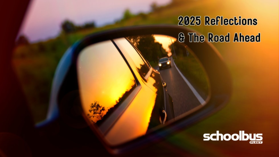 photo of a car's rear-view mirror of the road behind them and text that says "2025 reflections"