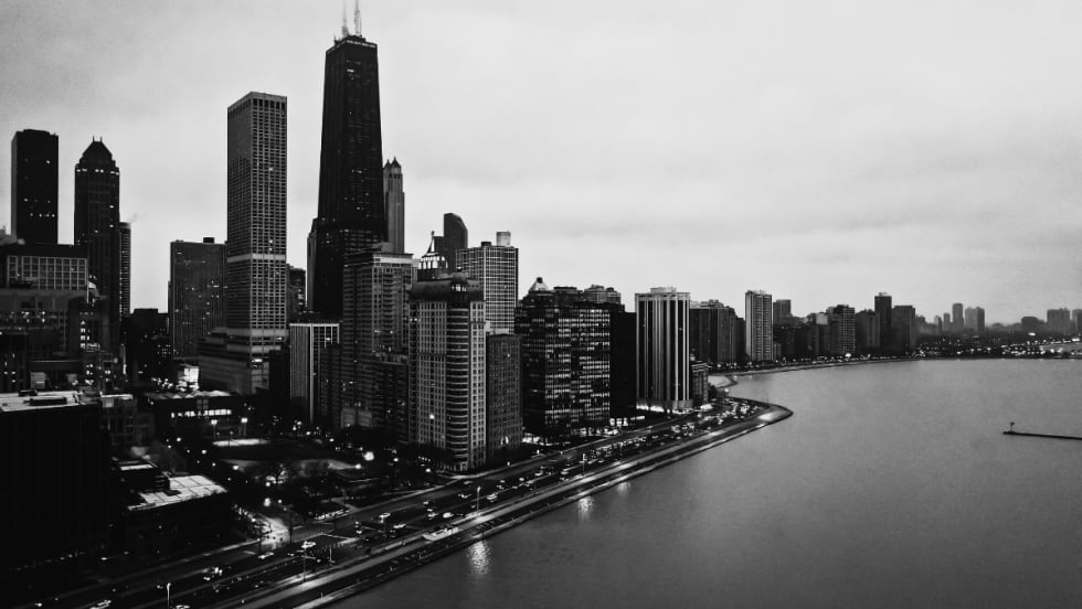Black and white image of the Chicago city skyline.