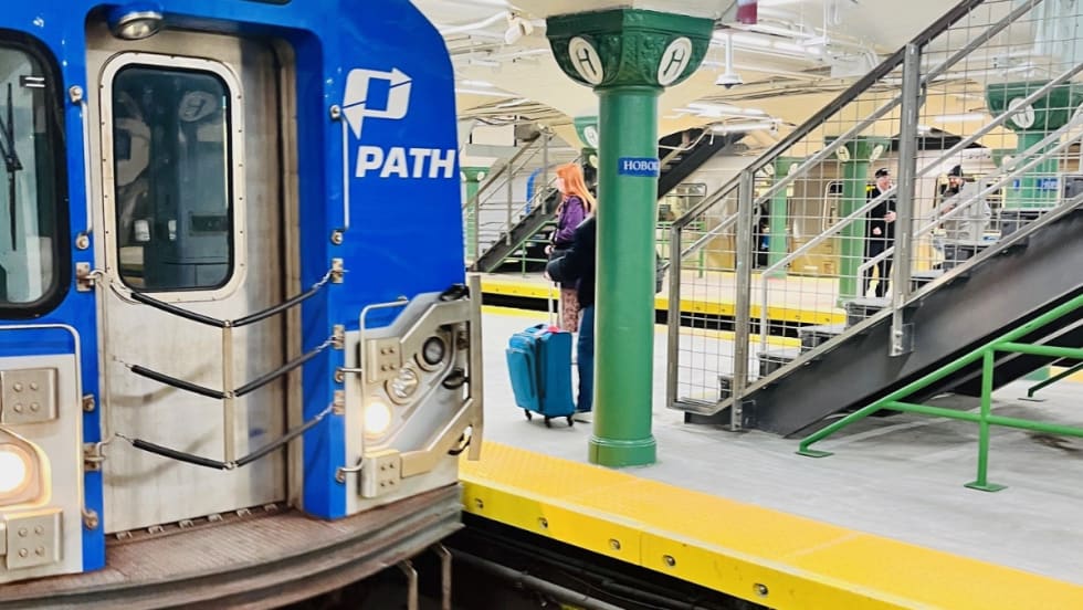 A PATH commuter rail at a Hoboken station reopening.