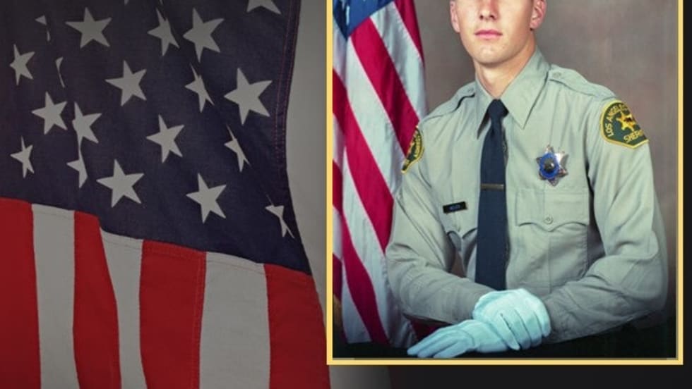Los Angeles County Sheriff's Department official badge and portrait with American flag