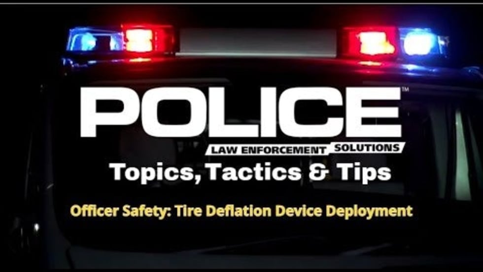 Police emergency lights with text about tire deflation tactics