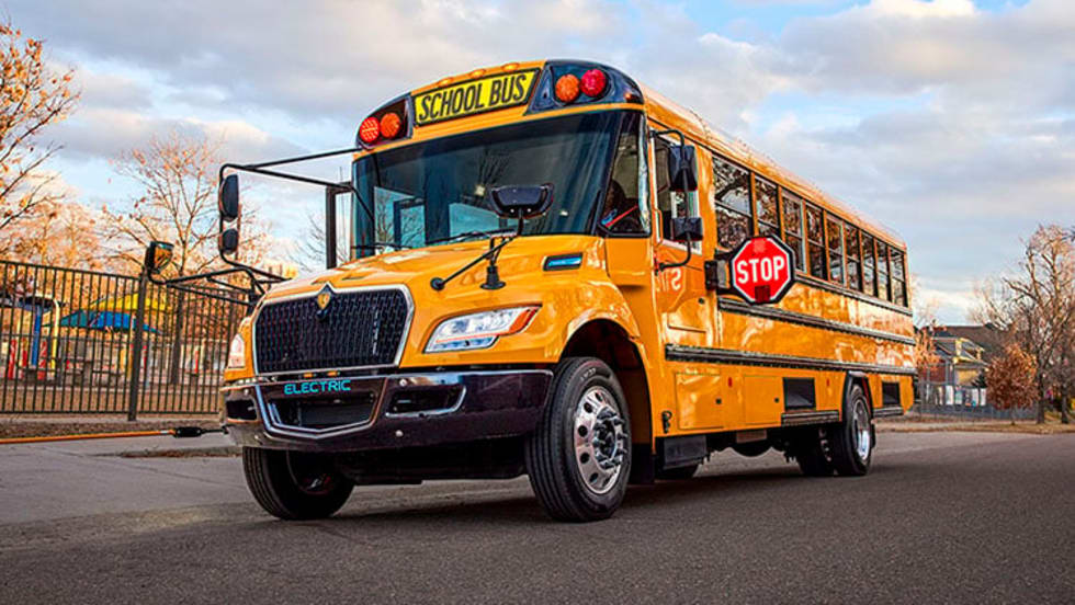 a school bus with illuminated signs