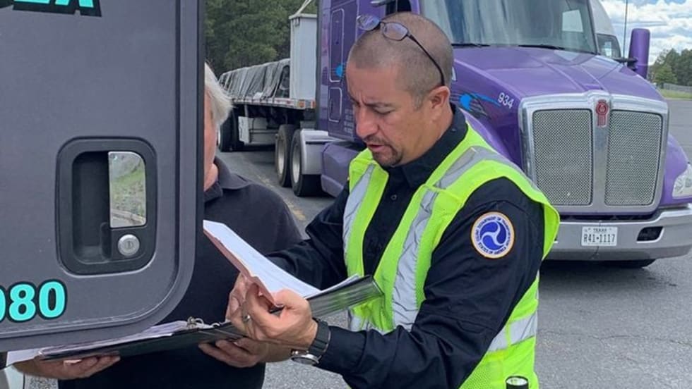 DOT inspection officer.