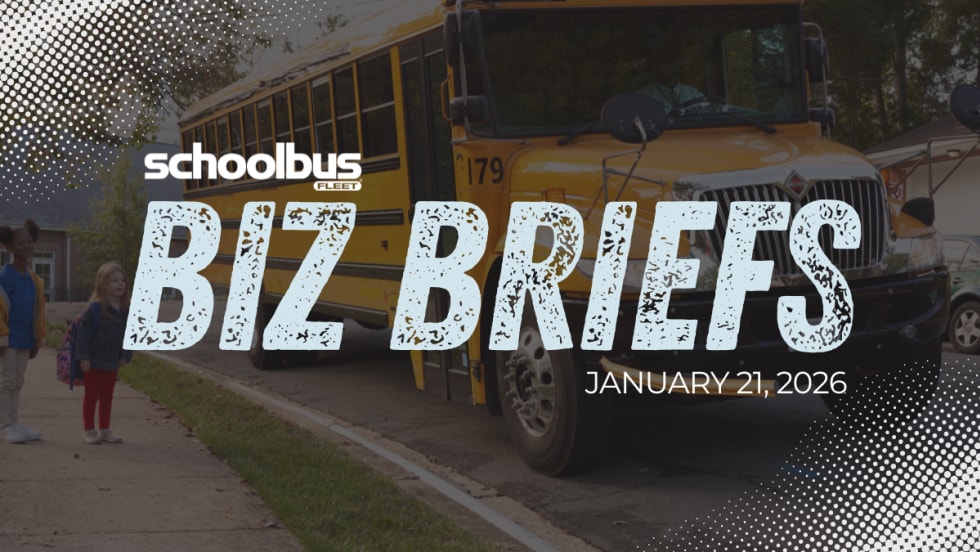 Two young students wait at a bus top while a school bus drives up with text reading "Biz Briefs."